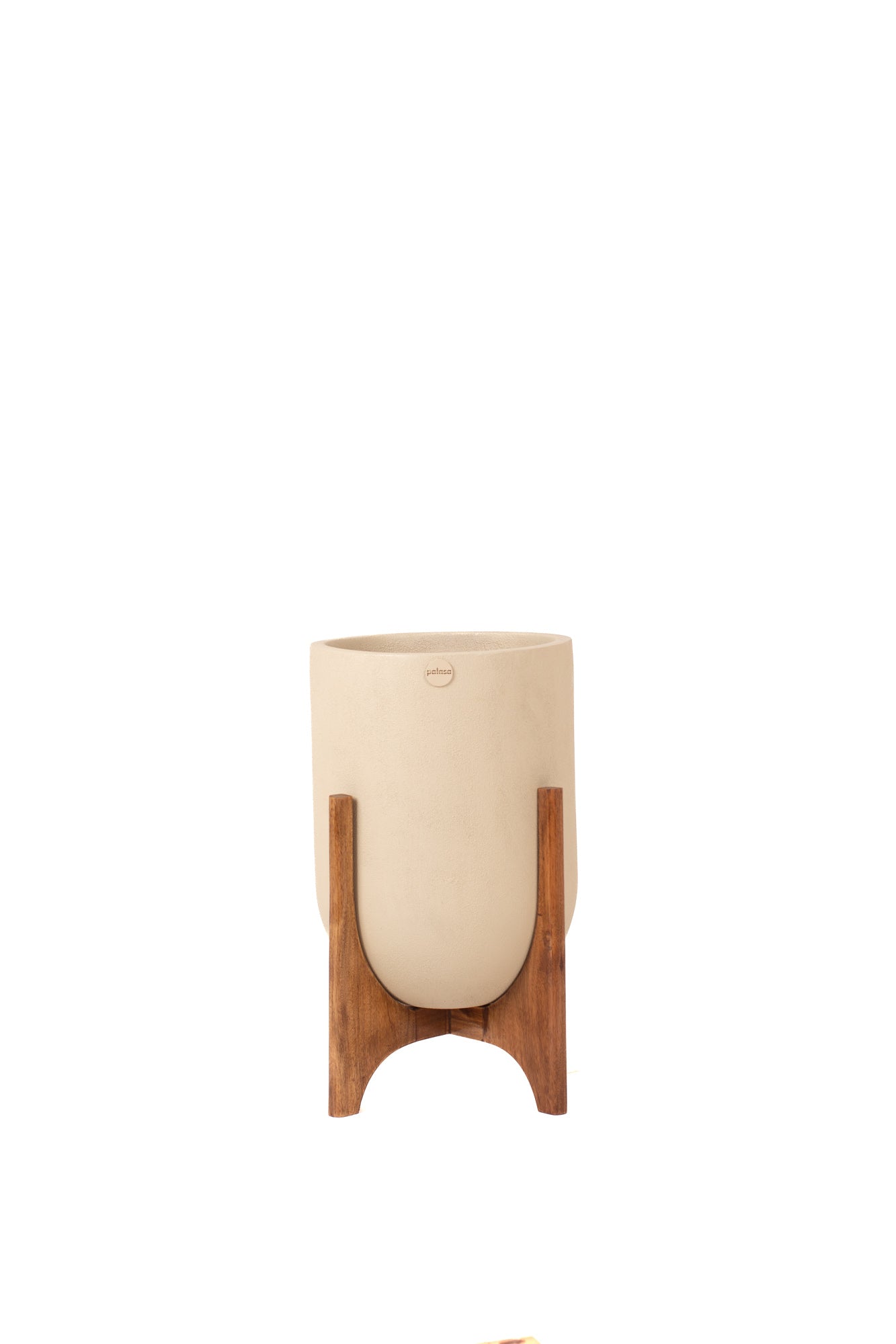An Ode to the mid century designs with the beige Ammo Planter with Woods stand. This Beige FRP Planter is a perfect planter to place indoors. Shop online for FRP Planter Pots.