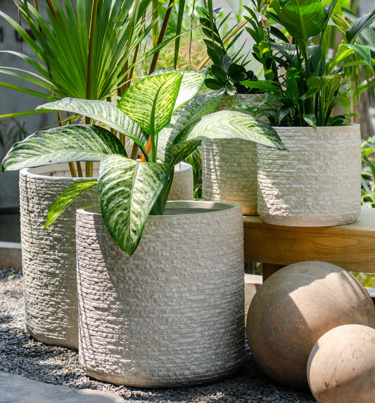 Marley GRC Planter pot series is an excellent option for outdoor commercial or residential spaces. Combining concrete material and a textured look, this planter provides a visually appealing and durable structure that won't disappoint.
