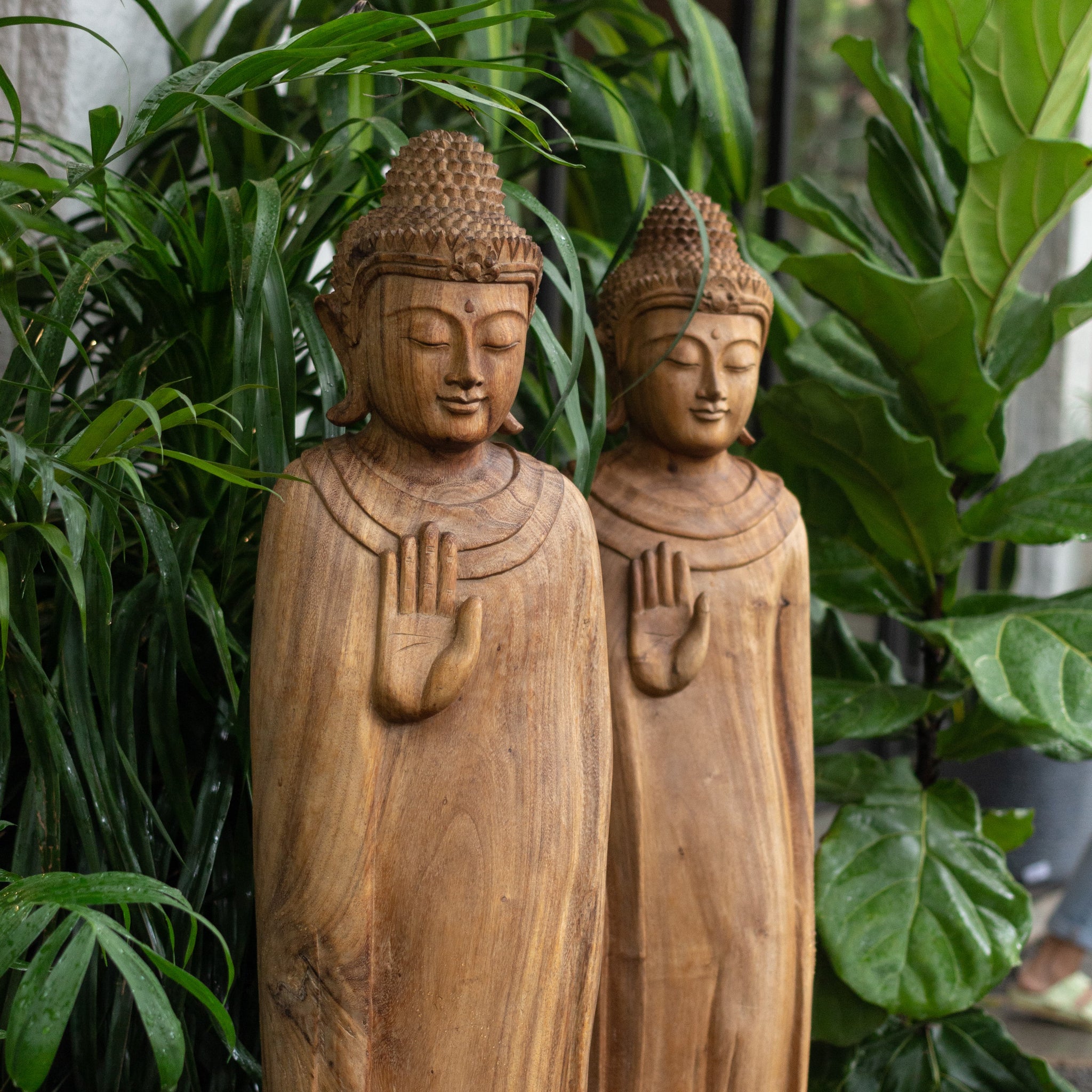 Transform Your Outdoor Space with These Zen Garden Ideas- wooden buddha 