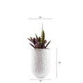 The allure of Palasa's white coral-finished Ammo FRP Planter lies in its unique rough texture, which adds a charming rustic appeal to its overall aesthetic. Buy White floor planter online India