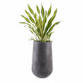 The Rony FRP Grey large planter by Studio Palasa is an ideal fit for living rooms, balcony's and gardens. This large planter has been designed to be tall and sleek with a grey concrete finish, making it the perfect addition to your space. Buy large planter pots online India.