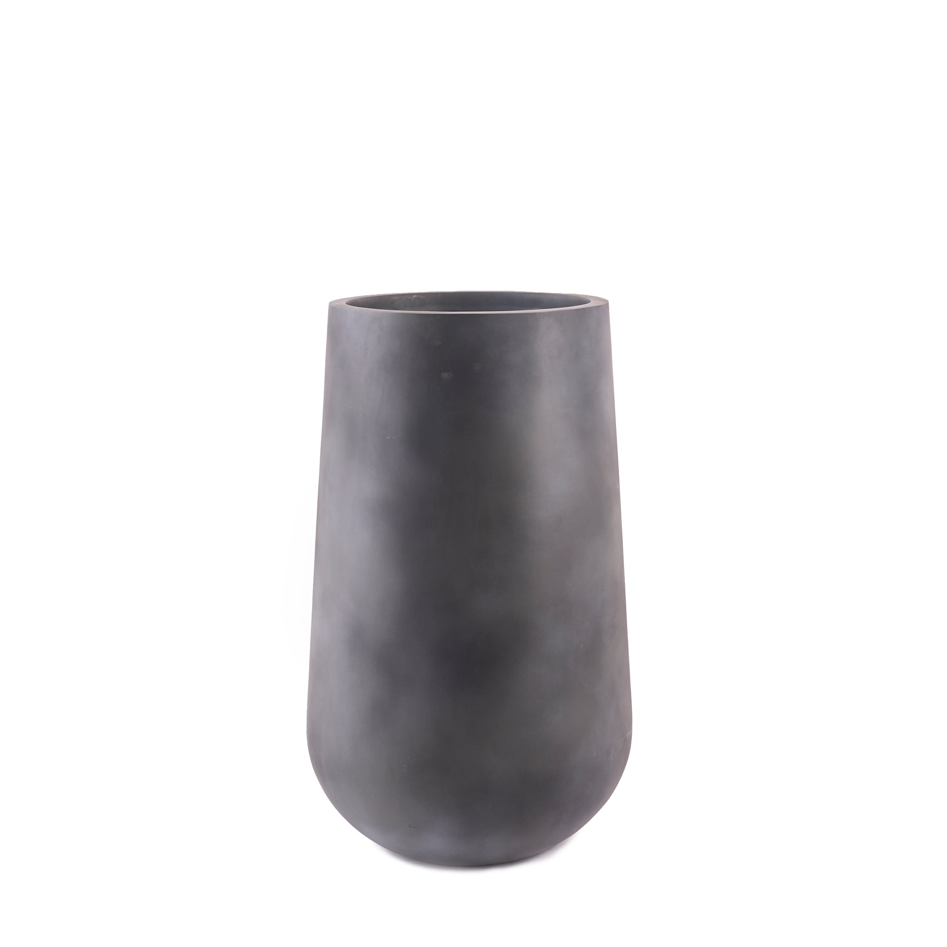 The Rony FRP Grey large planter by Studio Palasa is an ideal fit for living rooms, balcony's and gardens. This large planter has been designed to be tall and sleek with a grey concrete finish, making it the perfect addition to your space. Buy large planter pots online India.