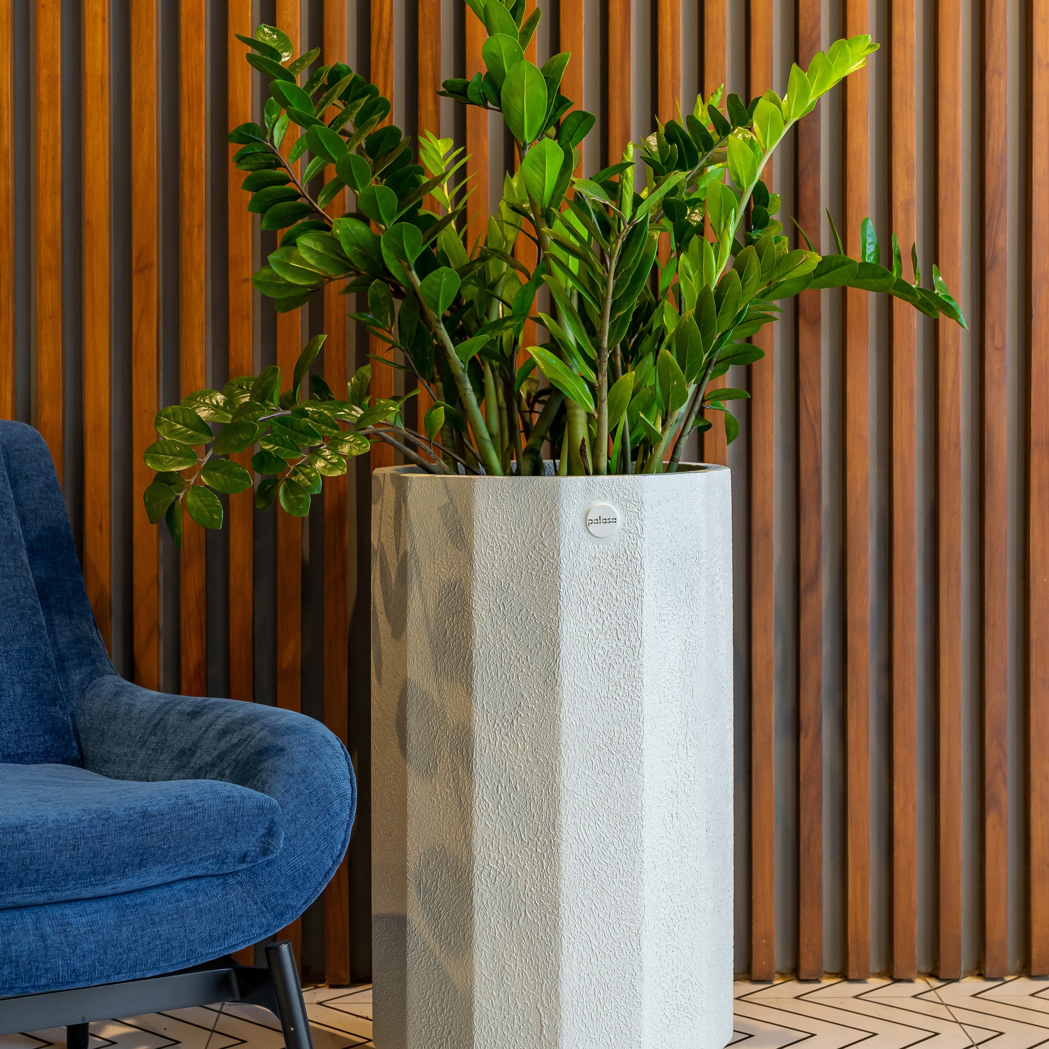 Buy Large beige planter pot online India. This tall ribbed planter can be placed in your living room, outdoor balcony, garden or even your entryway. Shipping free  Pan India