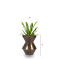 This Brass Metallic finished FRP Planter is a perfect example of contemporary design. Its unique funnel shape adds an eye-catching style to any space. Perfect for both indoor and outdoor settings, the Funnel Planter works well with a range of plants, such as Bamboo Palm, Dracaena Dara Singh, or Dracaena Draco.