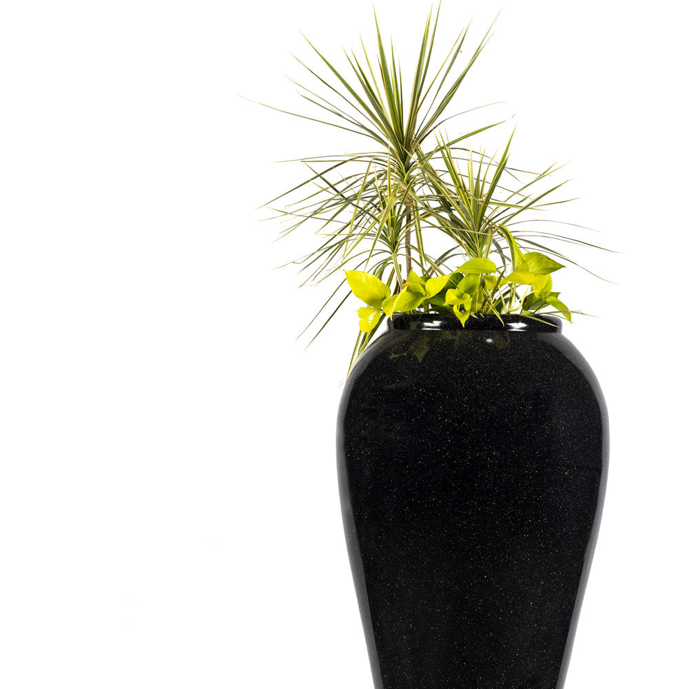 Black Trado S FRP planter is versatile and durable, suitable for both indoor and outdoor use. This indoor or ourdoor planter can be used in contemporary or traditional homes or offices and even garden spaces. Use The Black Trado Planter Pot as a statement piece and is available in 3 colours.